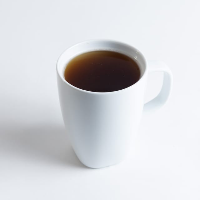 110. Freshly Brewed Coffee / Café Den.